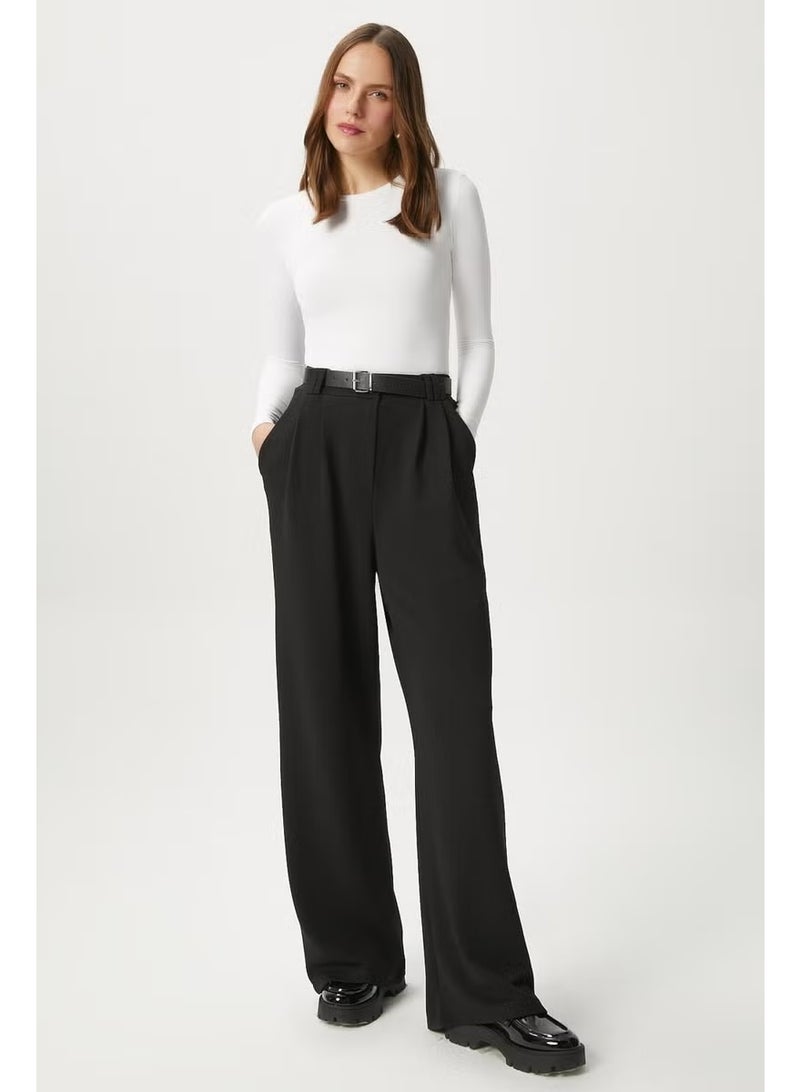 Ritnice Women's Rena Belted Lycra Black Palazzo Trousers - Image 1